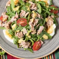 Tuna Salad · Tuna fish salad on top of romaine lettuce with hard boiled egg, tomato, red onion, and garli...