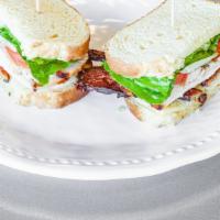 The Idaho Ranch Club · Sliced, roasted turkey, bacon, tomato, lettuce, pepper jack cheese, potato chips, and ranch ...