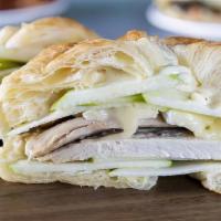 The Mason Sandwich · Sliced turkey breast, melted brie cheese, thinly sliced apples, and a mild honey mustard sau...