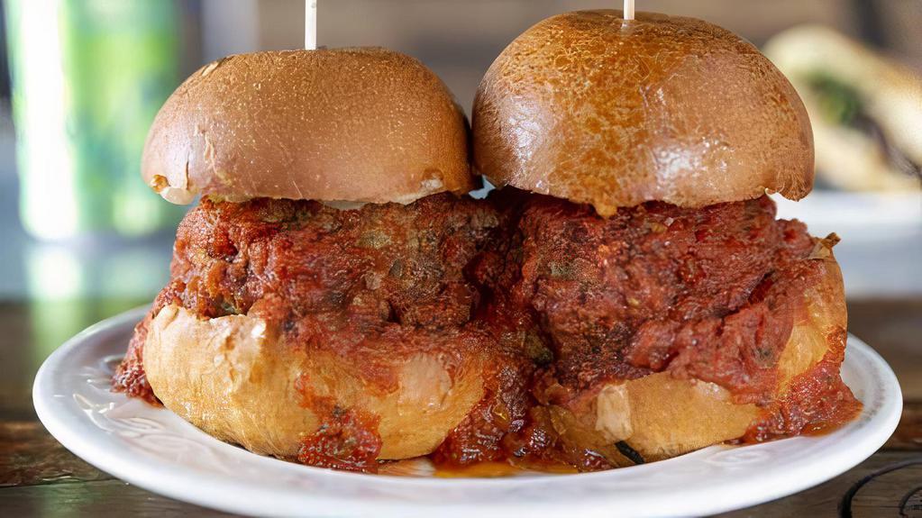 Meatball Sliders Sandwich · House-made Italian meatballs in our Sunday red sauce with melted mozzarella on toasty garlic bread sliders. Note: this is a saucy sandwich, and can get messy.