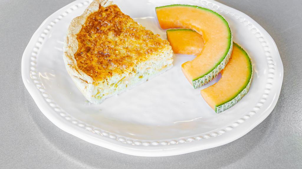 Green Chile & Three Cheese Quiche Slice · Slice our signature quiche made with mild green chilies and a blend of cheeses. Perfect for breakfast, lunch or dinner.