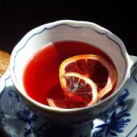 Hot Ginger Citrus Tea · Our hot Buzzbomb Tea - A blend of citrus, ginger, and honey.
