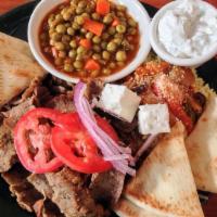 Gyro Dinner · Combination of ground lamb, beef, and spices. Served with rice, yia yia’s veggies, and pita.