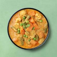Supreme Veggie Korma · Garden fresh vegetables simmered in rich coconut sauce, mixed with herbs, ground whole spice...