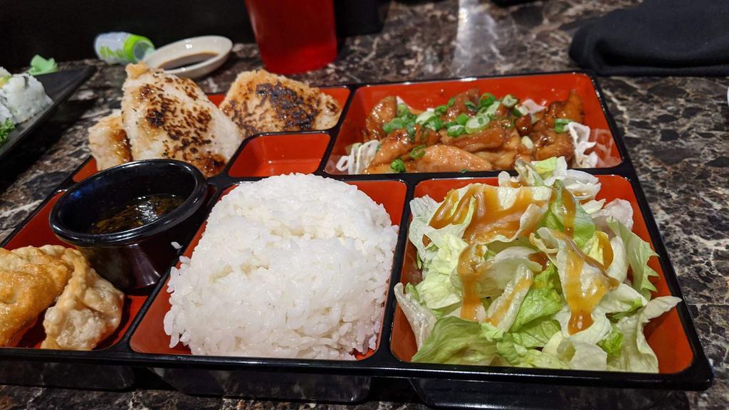 Dinner Box · Choose one protein - (fish katsu, katsu chicken, teriyaki beef, teriyaki chicken, teriyaki salmon for an extra charge. choose two sides - (California roll, gyoza, sashimi, tempura) Includes rice, salad, and a miso soup.