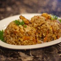 Fried Rice · White rice fried with carrots, onions, egg, and green onion. Add veggies, chicken, beef or s...