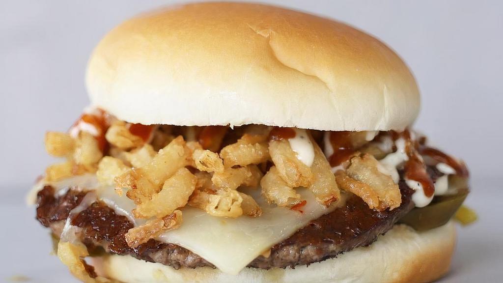 Tony'S Southern · Pepper Jack Cheese, Onion Strings, Jalapeños, Ranch Dressing, BBQ Sauce