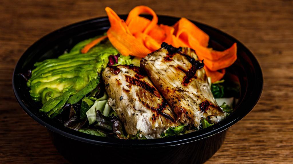 Mahi Mahi Salad · Spring mix, carrots, cabbage, avocado, topped with a mahi filet seasoned in lemon and pepper then grilled topped with teriyaki and a side of roasted sesame dressing.