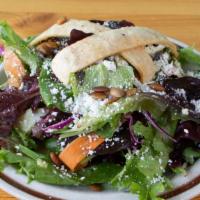 Salad · Fresh local seasonal greens tossed in avocado-lime vinaigrette. Topped with cotija cheese, t...