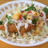 Baja Fish Taco · Local fresh line caught white fish of the day, marinated then battered with our gluten-free ...