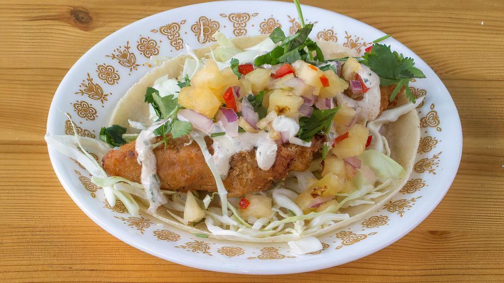 Baja Fish Taco · Local fresh line caught white fish of the day, marinated then battered with our gluten-free masa and fried 