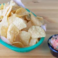 Chips & Salsa · Basket of local Juanitas corn chips and our fresh made pico de gallo.