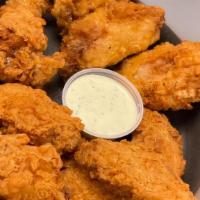 Wings (8) · breaded, seasoned, flavorful, seasoned wings with a side of our cilantro jalapeno sauce!