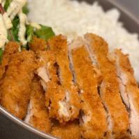 Crispy Chicken · Crispy breaded chicken, served with a side dipping sauce.