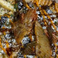 Churrpapi Fries · Crinkle fries tossed in our house-made sweet and savory spices, caramel drizzle, icing drizz...