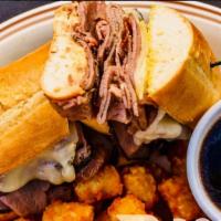 French Dip · Thinly sliced roast beef, melted swiss on garlic bread with au jus. Served with your choice ...