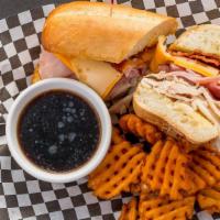 Club Dip · Our popular club sandwich with thin sliced turkey, ham, bacon, lettuce, tomato, American and...