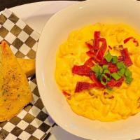 Bacon Mac & Cheese · Macaroni smothered with creamy homemade cheese sauce and bacon. Served with French bread.