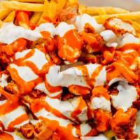 Tylor Fries · A large serving of French fries covered in chicken, bacon, bleu cheese dressing and buffalo ...