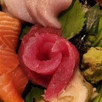 Boulder Bowl · tuna, yellowtail and salmon over sushi rice
