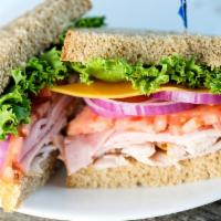 House Of Bread Club Sandwich · Turkey, ham, cheddar, lettuce, tomato, red onion, mustard, mayo