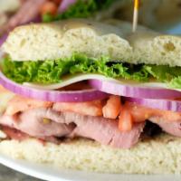 Western Sandwich · Roast beef, provolone cheese, lettuce, tomato, red onion, horseradish sauce, mayo