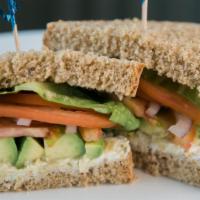 Veggie Delight Sandwich · Avocado, cream cheese, artichoke hearts, lettuce, tomato, red onion, olive oil, balsamic vin...