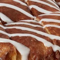Large Cinnamon Crunch · pan dough topped with a cinnamon and brown sugar glaze, with an Icing drizzle