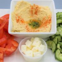 Hummus Platter · Our authentic Lebanese garbanzo blend, toasted flatbread, feta crumbles, tomato and cucumbers.