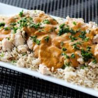 Chicken Coco · Marinated chicken breast pieces braised in select seasonings. Covered w/ our rich coconut cu...