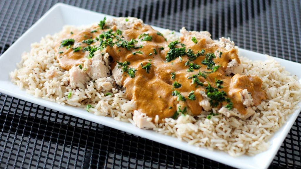 Chicken Coco · Marinated chicken breast pieces braised in select seasonings. Covered w/ our rich coconut curry sauce. SERVED WITH BASMATI RICE!