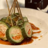 Galaxy Lollipop* · Salmon, avocado, crab mix, strawberries, lemon, sesame seeds with ponzu sauce wrapped in a c...