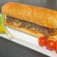 Philly Cheese Steak (Sandwich) · Philly cheese steak sandwich served with Grilled onion, bell peppers, mushrooms and Swiss ch...
