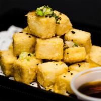 Agedashi Tofu · Deep fried tofu in soy broth with bonito flakes and green onion