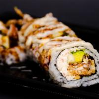 Spider Roll · Soft shell crab, crab mix, avocado, cucumber, eel sauce, yum yum sauce, (spicy option availa...