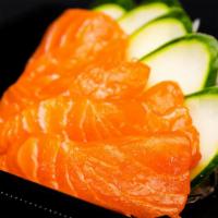 Salmon Sashimi · This item may contain raw or undercooked ingredients or may be cooked to order. Consuming ra...