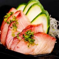 White Fish Sashimi · This item may contain raw or undercooked ingredients or may be cooked to order. Consuming ra...