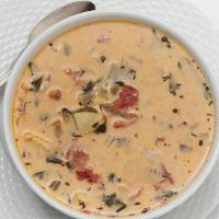 Mama Leone'S Soup · Chicken breast, tomatoes, onion, celery, spinach, and cream with chicken stock