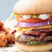 Bacon Cheeseburger · Angus beef, lettuce, American cheese, bacon, onion and pickles with burger sauce on our hous...