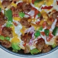 Gourmet Pan-Style Pizza Creator · 7” gourmet pizza piled high with your choice of toppings and extra cheese on top of a freshl...