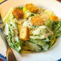Ceasar Salad  (Serves 2) · A bed of romaine,  shredded parmesan cheese and croutons served with a large side of classic...