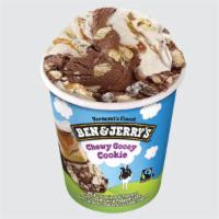 Chewy Gooey Cookie Ben & Jerry'S Ice Cream Pint · Milk Chocolate & Coconut Ice Creams with Fudge Flakes, Shortbread Cookies & Caramel Swirls