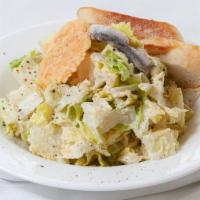 Grilled Chicken Caesar · Classic Caesar with fresh romaine, parmesan cheese & grilled chicken tossed in Caesar dressi...