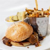 Beef Brisket Sandwich · House Smoked Beef Brisket, Cheddar Cheese
Chipotle Molasses Barbeque Sauce, Coleslaw, Dill P...