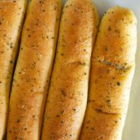 Garlic Breadsticks (2) · Comes with a side of marinara!