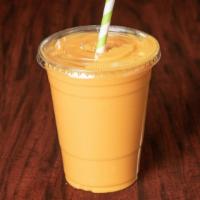 Mango Lassi · A cold drink made of mango pulp,yogurt ,water and sugar added with spices