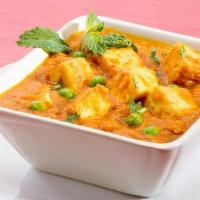 Matar Paneer (12 Oz) · Green peas cooked with home mode cheese in a mild gravy source.