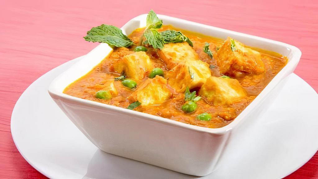 Matar Paneer (12 Oz) · Green peas cooked with home mode cheese in a mild gravy source.