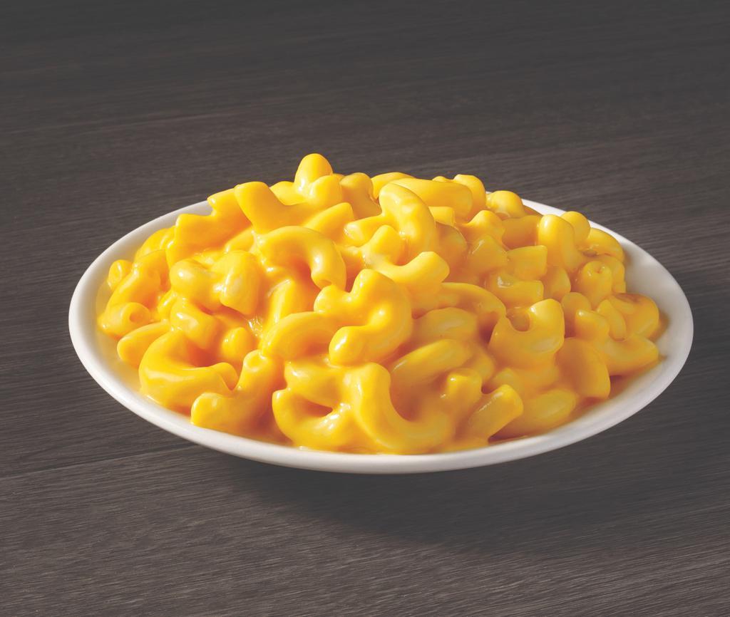 Side Of Mac & Cheese · Classic home-style macaroni and cheese prepared with delicate cheddar cheese sauce and tender noodles.
