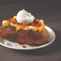 Loaded Baked Potato · A perfectly baked potato loaded with cheese and bacon.